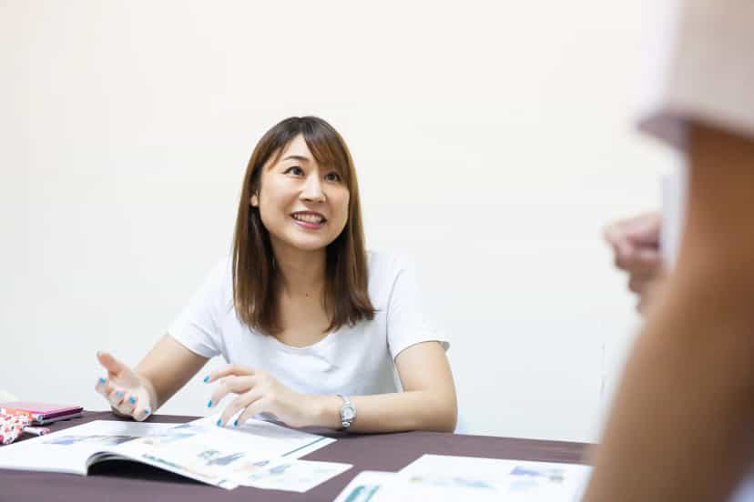 A CPILS student practicing speaking in a one-on-one English lesson